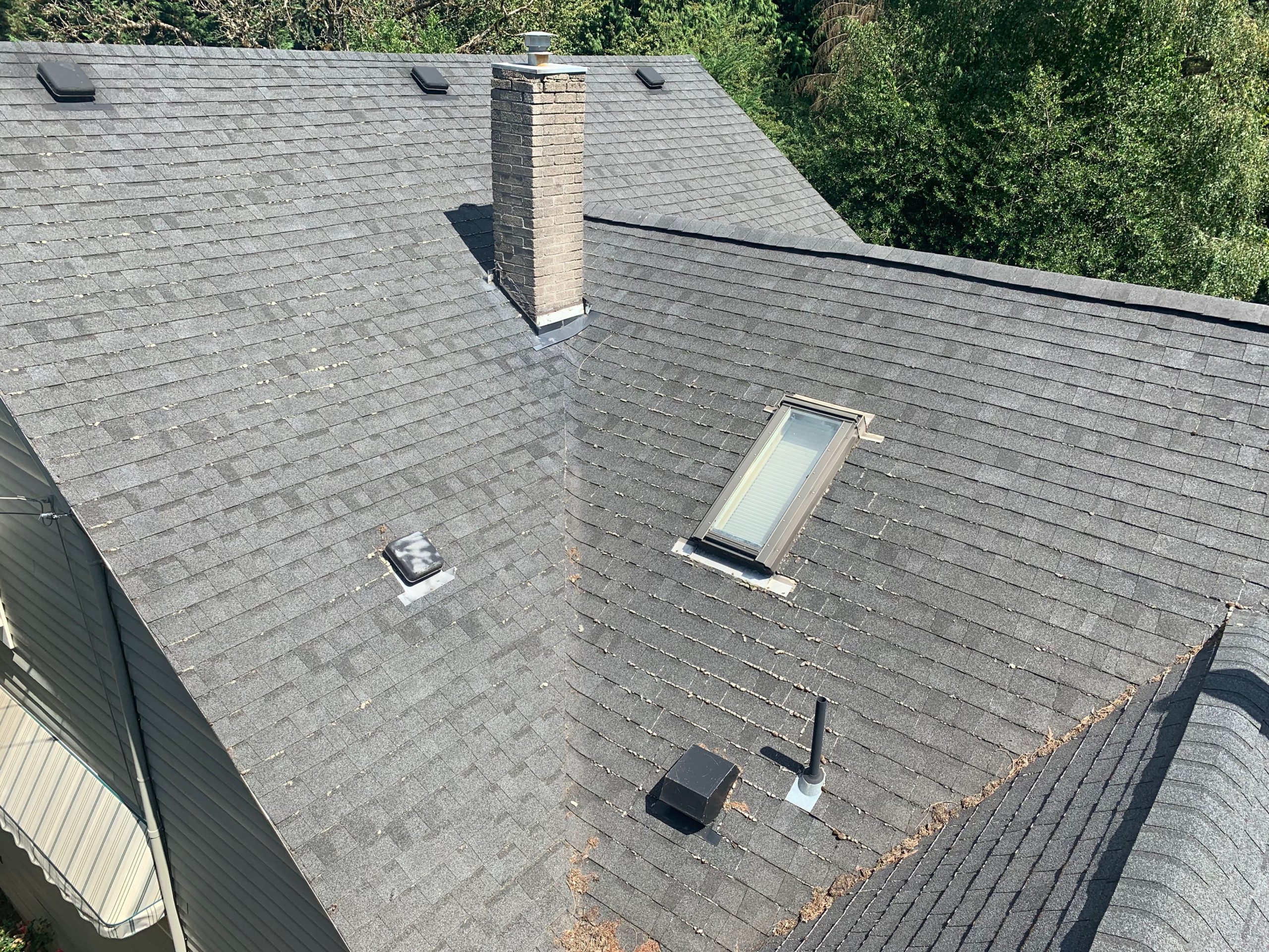 close up of roof skylight and chimney